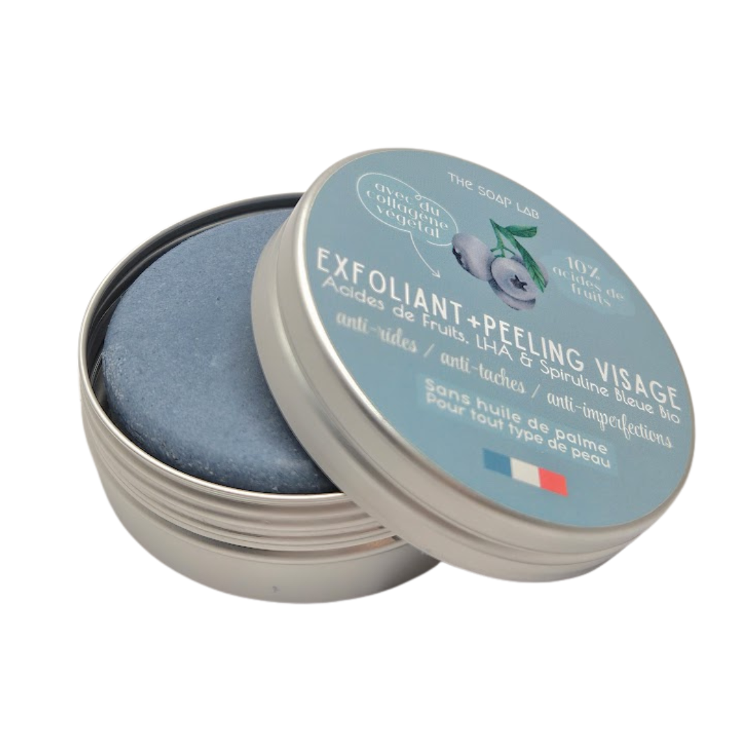 exfoliant et masque peeling solide pour le visage aux acides de fruits et LHA / dans boite mi-ouverte / sur fond blanc